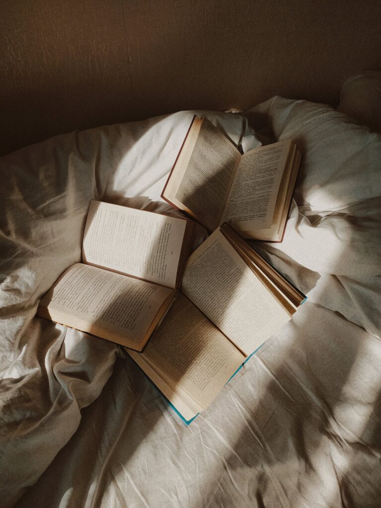 opened-books-on-the-bed